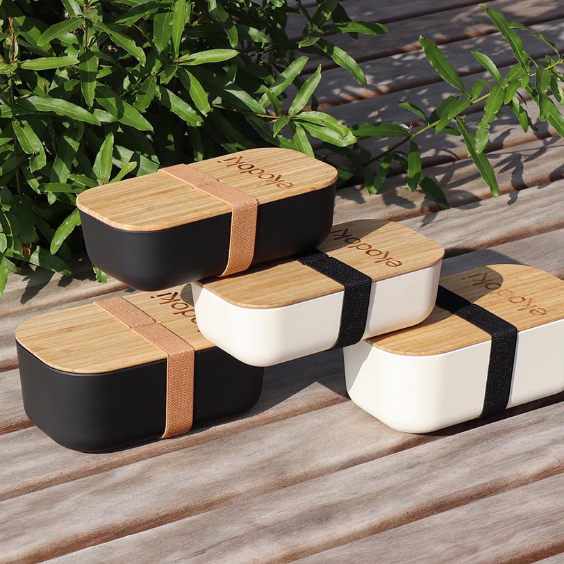 four bamboo lunchboxes from the brand eKodoKi, used to illustrate the brand's collection of bamboo accessories