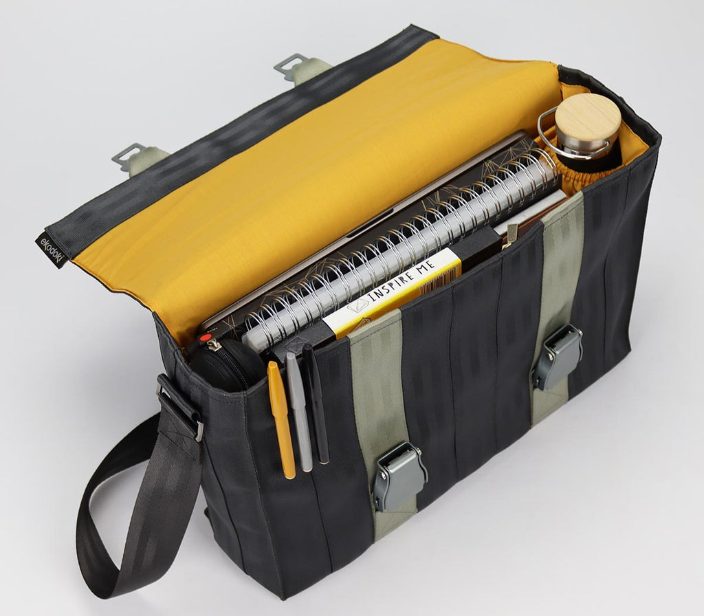black seatbelt messenger bag L inside with bottle and documents eKodoKi RE-BELT