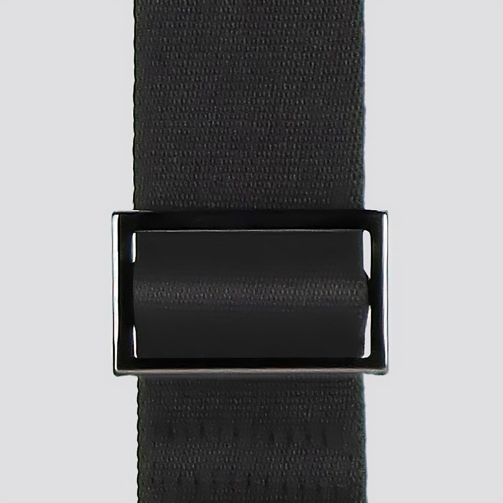 detail of the adjustable strap, featuring a stainless steel triglide, on the KWORK crossbody bag from the brand eKodoKi