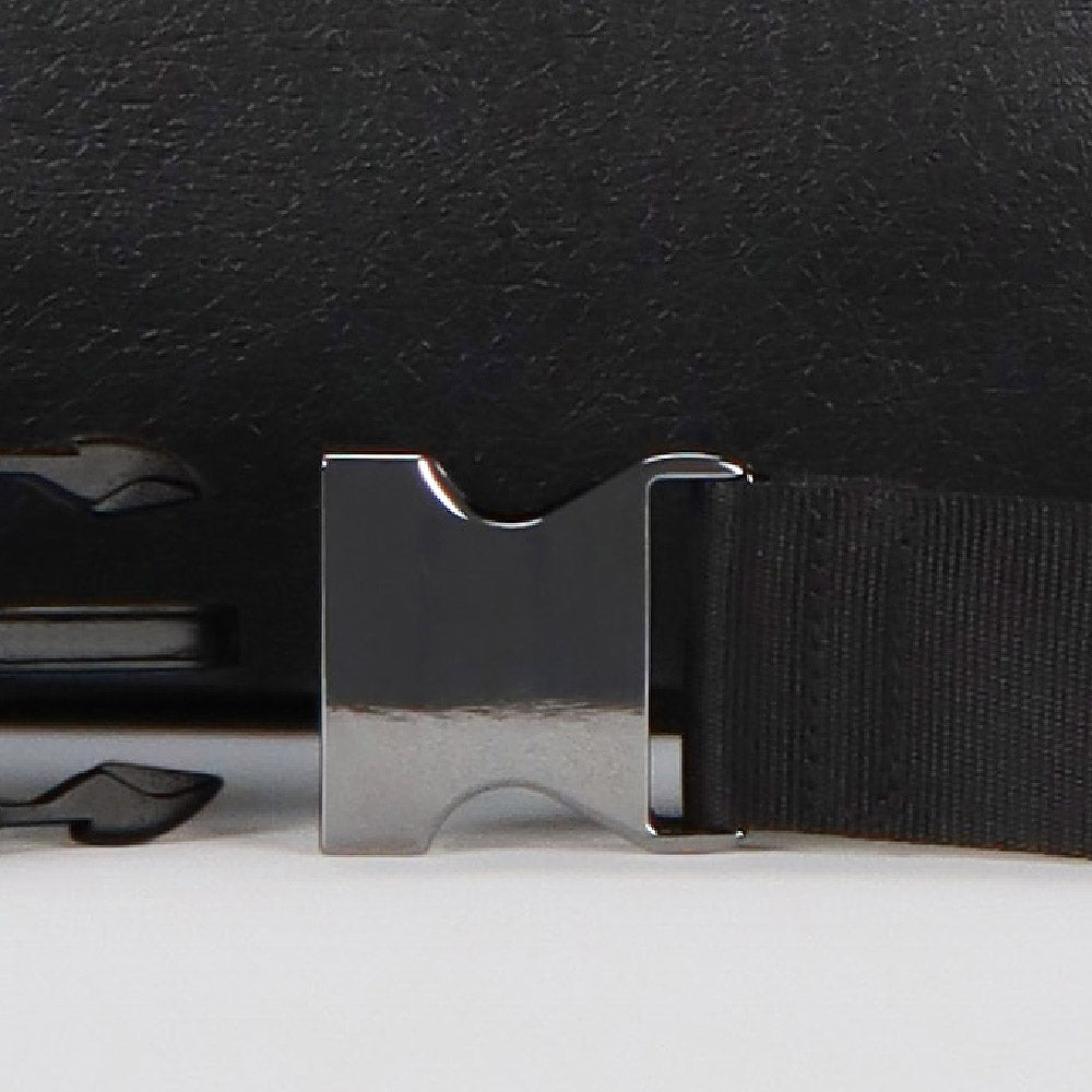 close-up detail of the stainless steel buckle from the strap of the RE-BELT sling bag from the brand eKodoKi