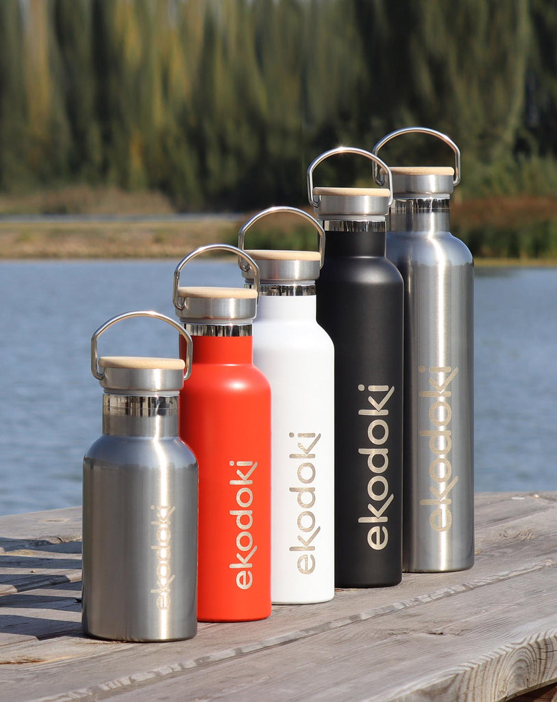 red white black brushed reusable thermos bottles from the brand eKodoKi, used as mobile banner
