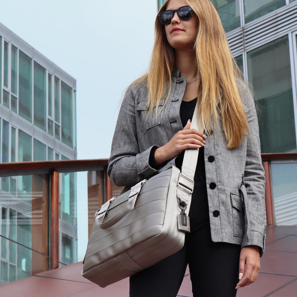 sand seatbelt briefcase M on female fashion model shoulder crossbody standing eKodoKi RE-BELT