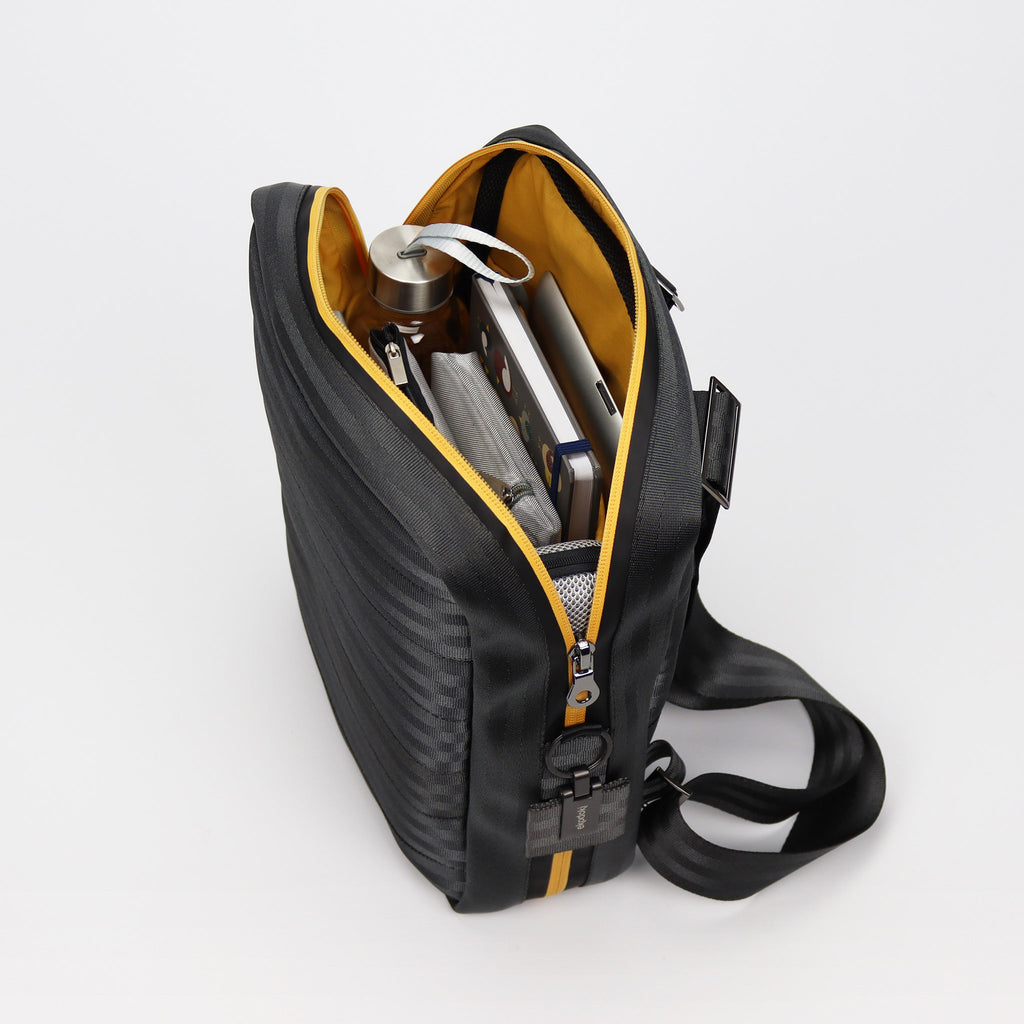 black seatbelt backpack M inside with bottle and documents eKodoKi RE-BELT