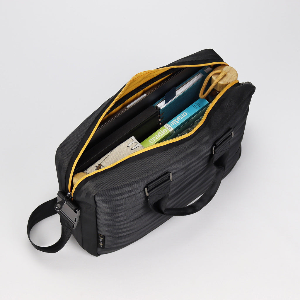 black seatbelt briefcase M inside with bottle and documents eKodoKi RE-BELT