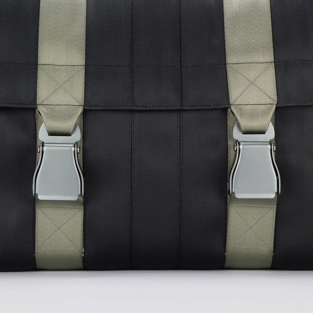 black seatbelt messenger bag L light grey buckles close up in eKodoKi RE-BELT