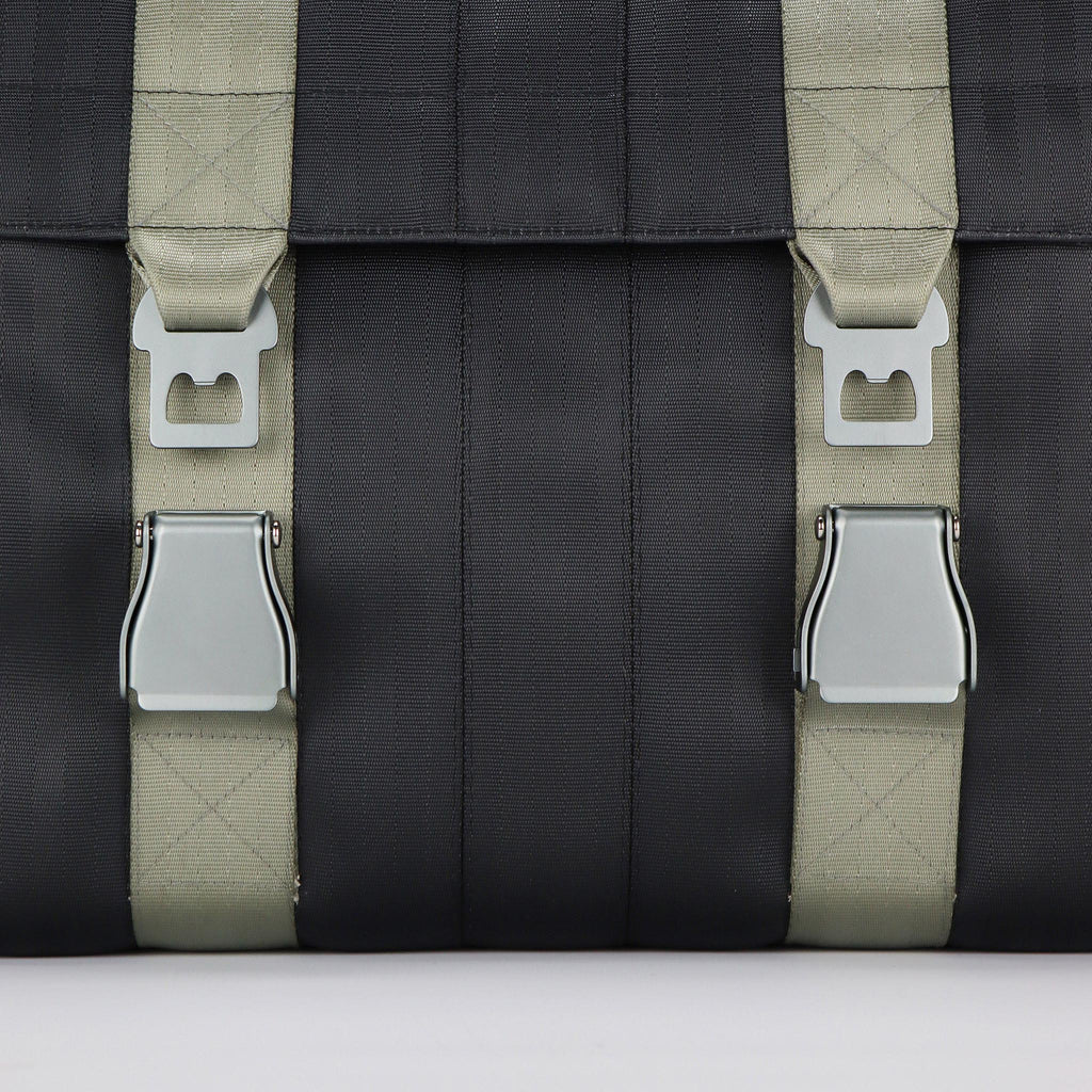 black seatbelt messenger bag L light grey buckles close up out eKodoKi RE-BELT