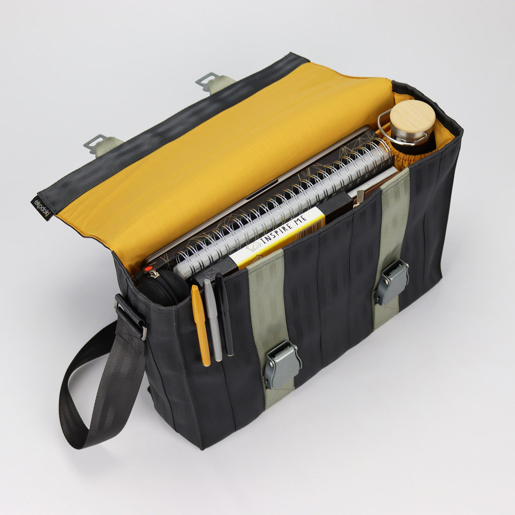 black seatbelt messenger bag L inside with bottle and documents eKodoKi RE-BELT