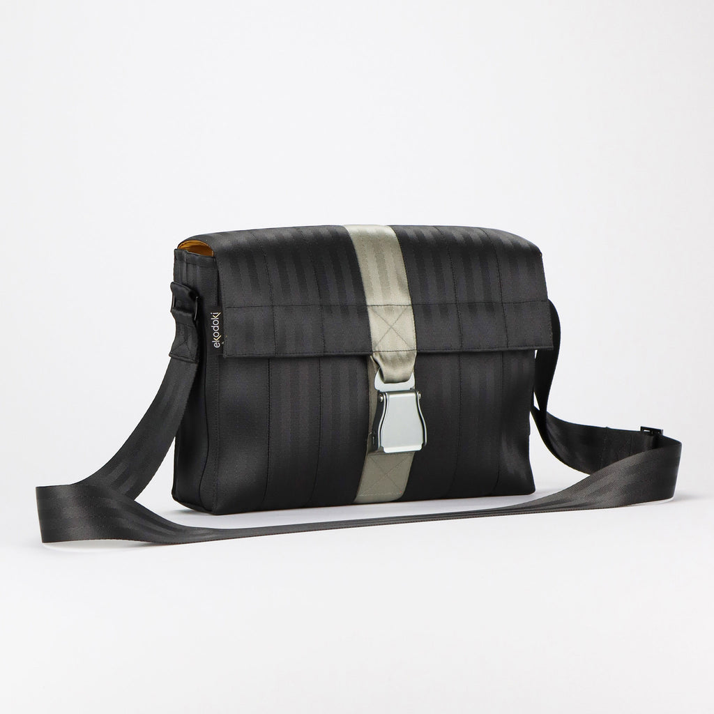 black seatbelt messenger bag M front featuring light grey buckle eKodoKi RE-BELT