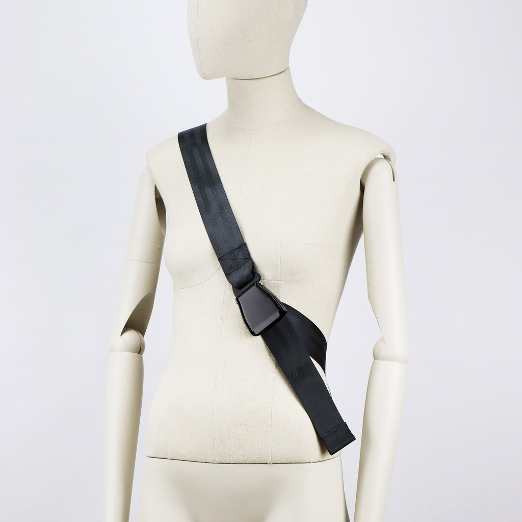 black seatbelt sling bag L strap black buckle on female mannequin eKodoKi RE-BELT