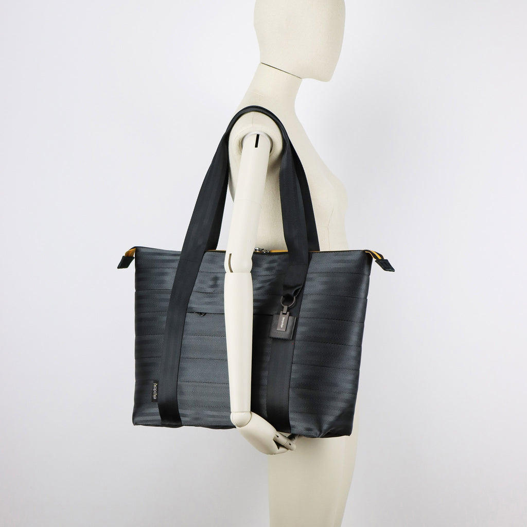 black seatbelt tote bag L on female mannequin shoulder eKodoKi RE-BELT