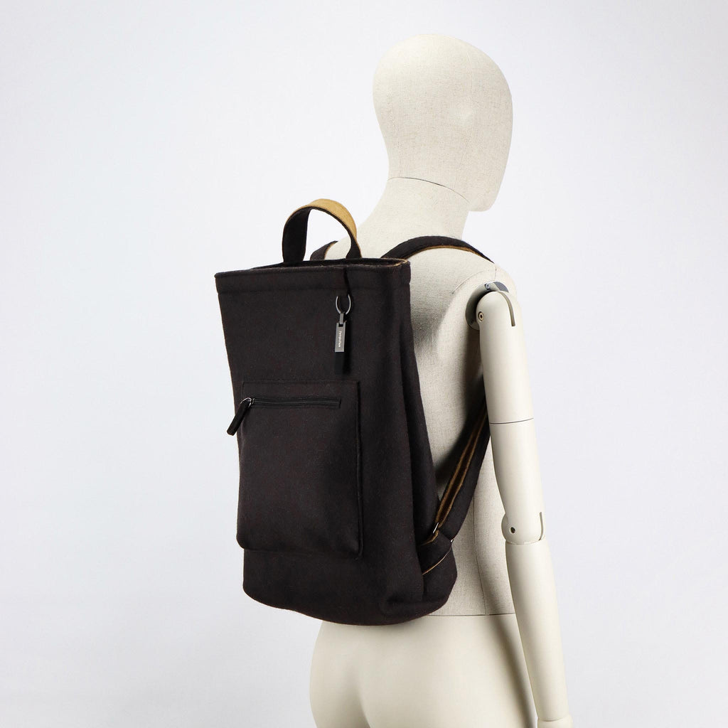 black wool felt courier backpack on male mannequin shoulders eKodoKi WOOLI