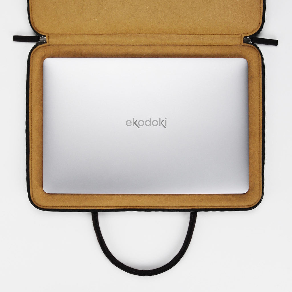 black wool felt laptop bag 17 inch computer compartment flatlay eKodoKi WOOLI