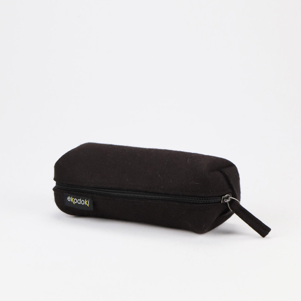 black wool felt zipper pencil case laying eKodoKi WOOLI