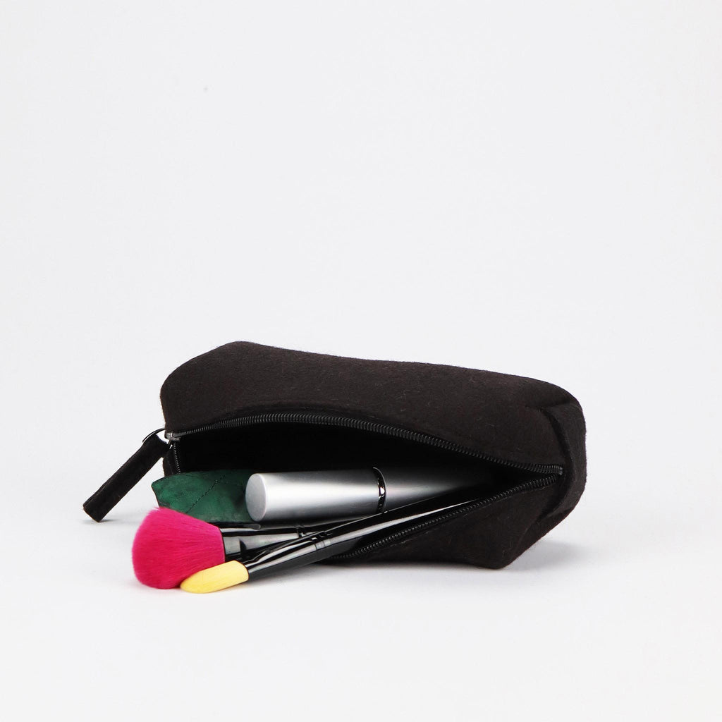 black wool felt zipper pencil case opened with makeup inside eKodoKi WOOLI