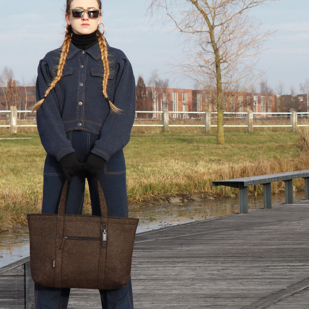 brown wool felt tote bag L in female fashion model hands eKodoKi WOOLI