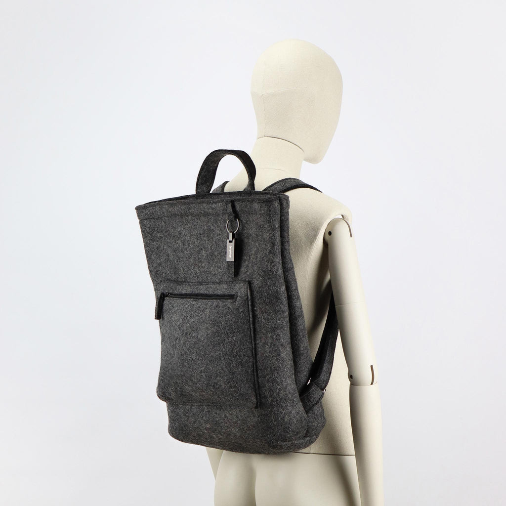 grey wool felt courier backpack on female mannequin shoulders eKodoKi WOOLI