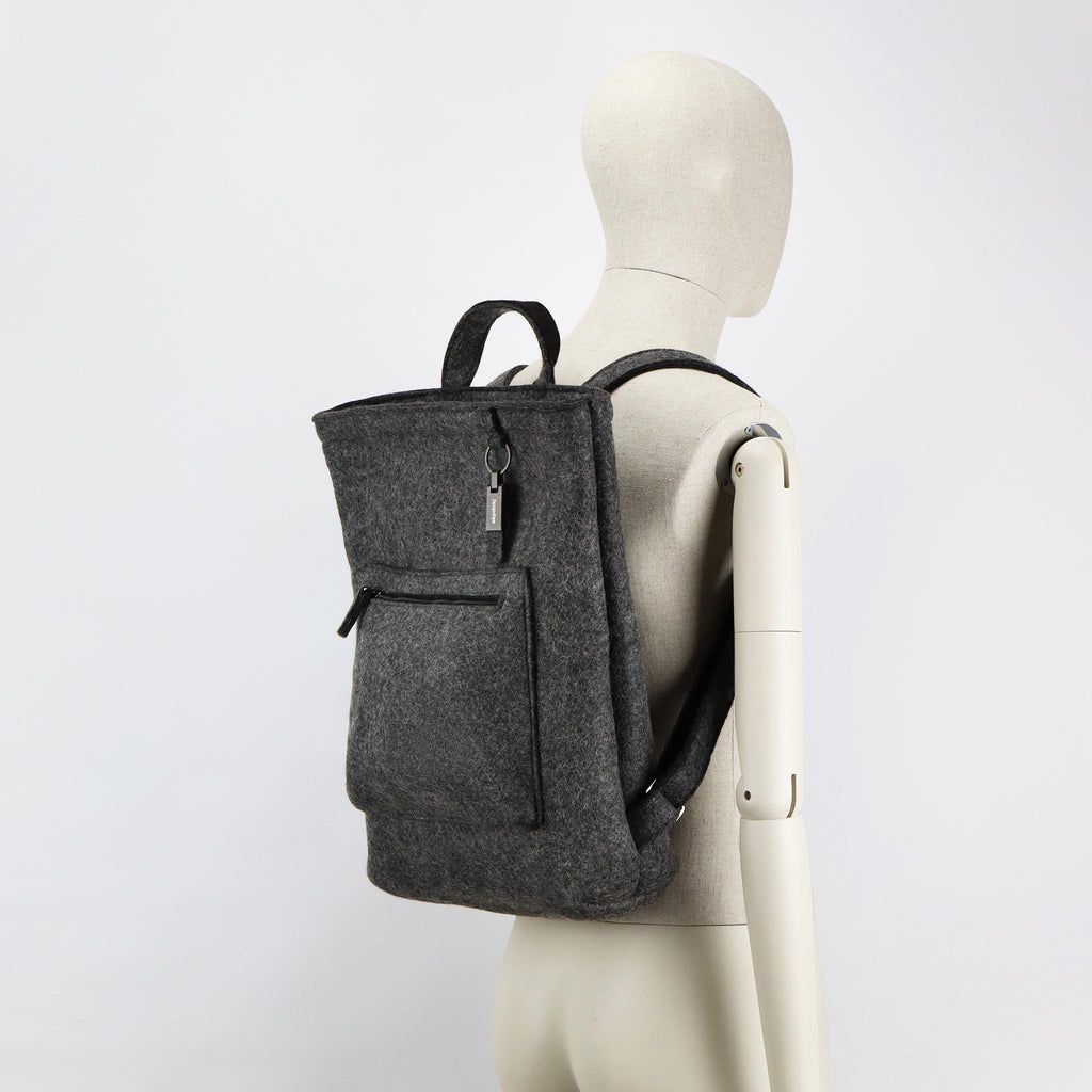 grey wool felt courier backpack on male mannequin shoulders eKodoKi WOOLI