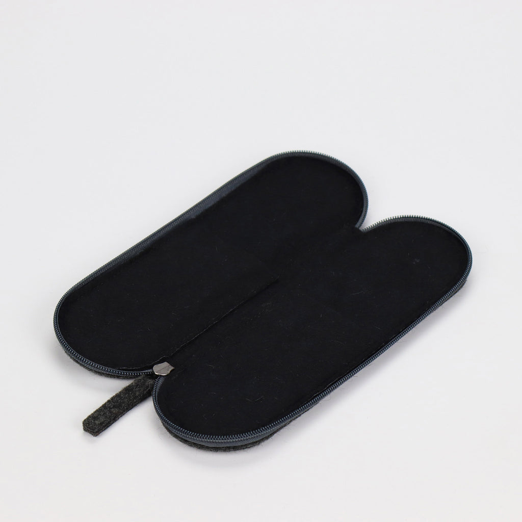 grey wool felt cutlery case opened showing black wool felt lining laying eKodoKi WOOLI