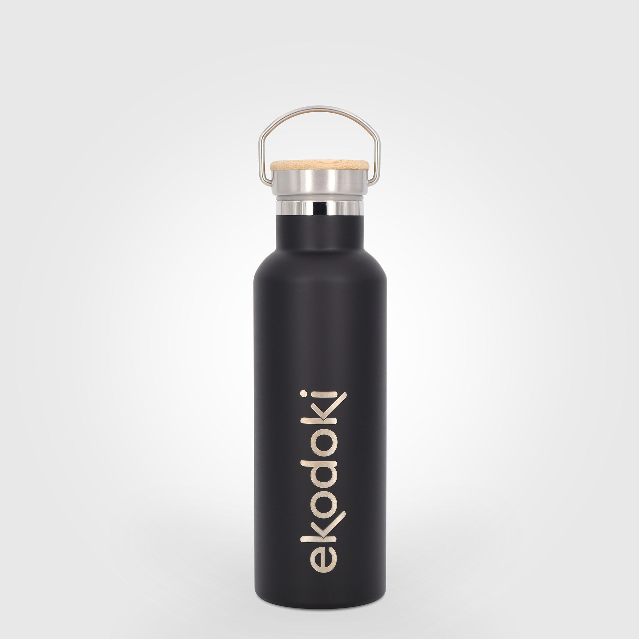 https://ekodoki.com/cdn/shop/products/reusable-black-stainless-steel-insulated-bottle-600ml-carrying-handle-eKodoKi-THERMOS_2048x.jpg?v=1642528965