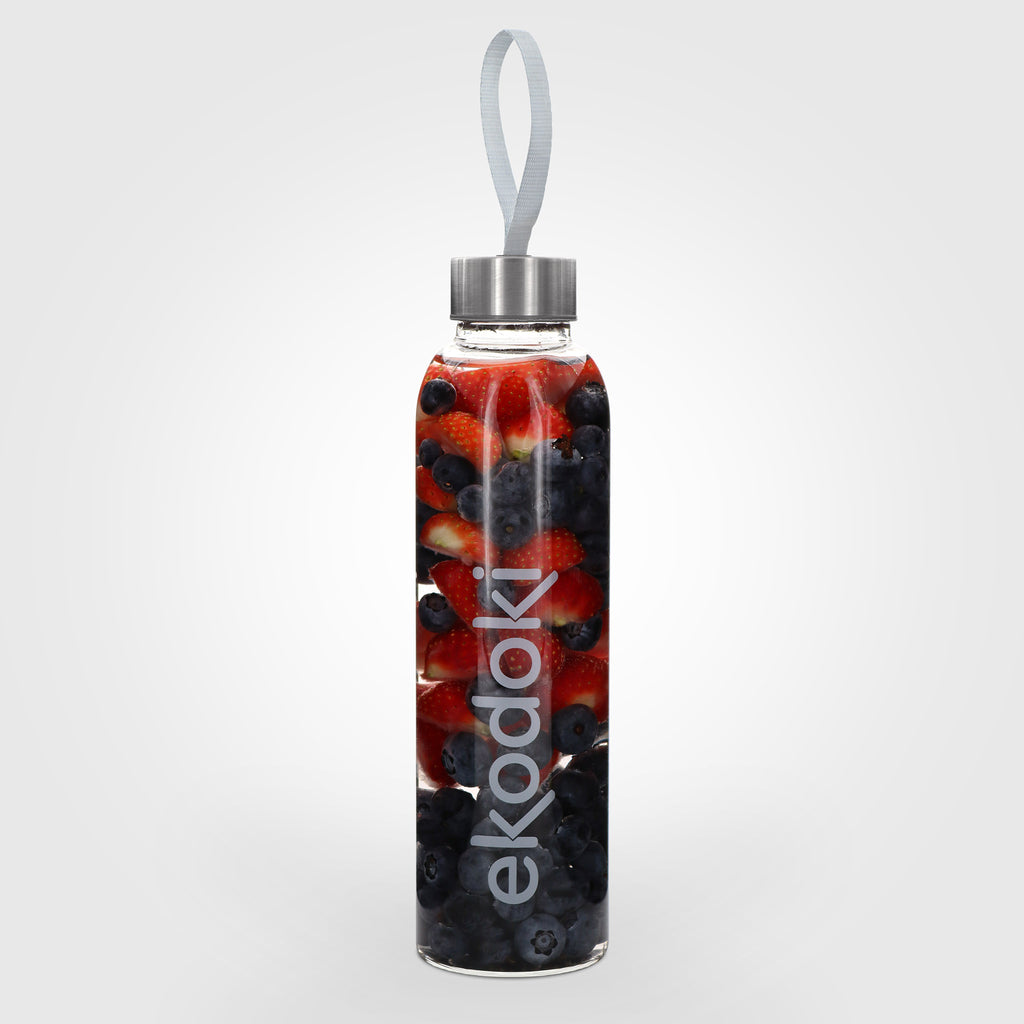 reusable glass water bottle 550ml filled with red fruits aluminium cap closure eKodoKi HYDRO