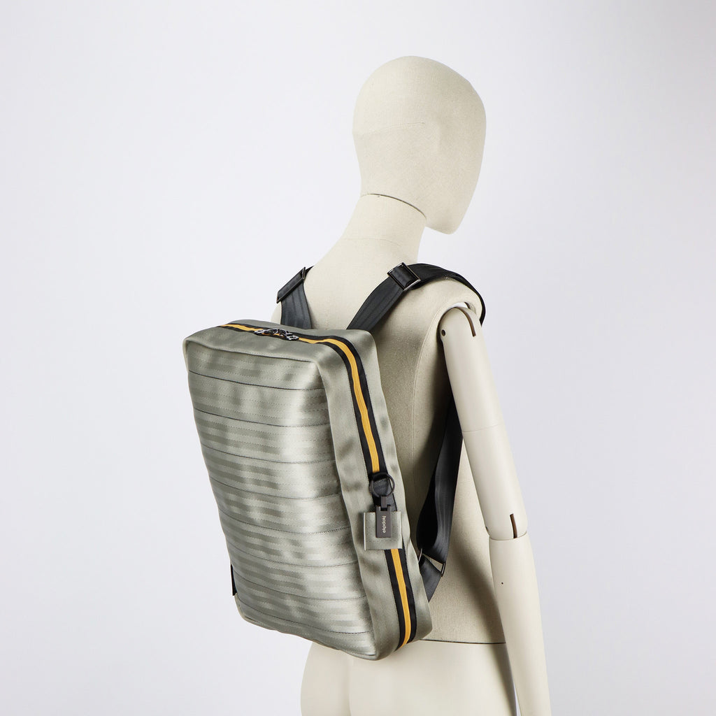 sand seatbelt backpack L on female mannequin shoulders eKodoKi RE-BELT
