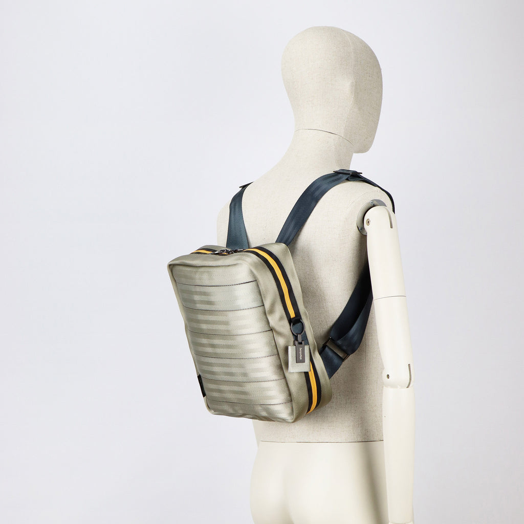 sand seatbelt backpack M on male mannequin shoulders eKodoKi RE-BELT