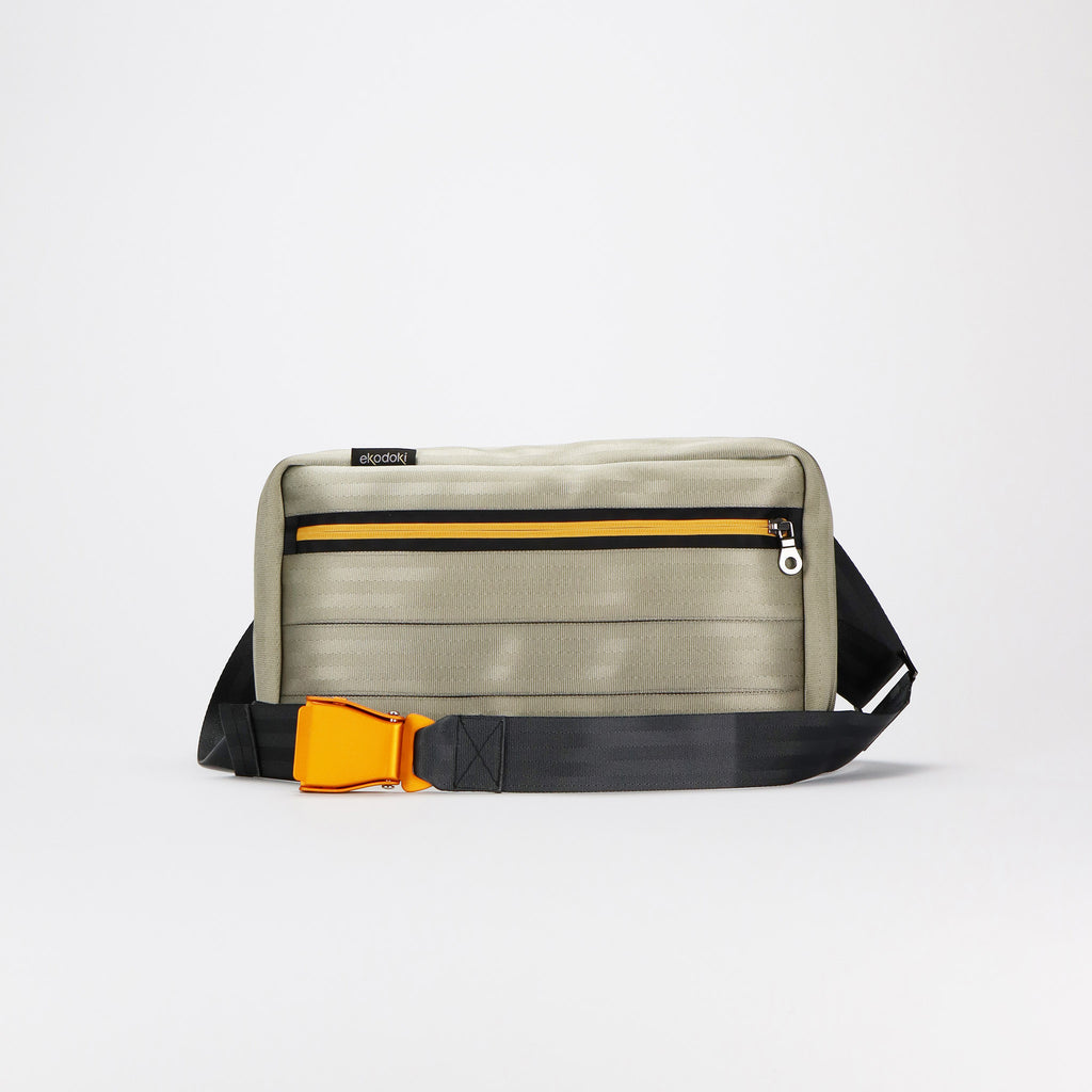 sand seatbelt sling bag L featuring orange buckle front eKodoKi RE-BELT