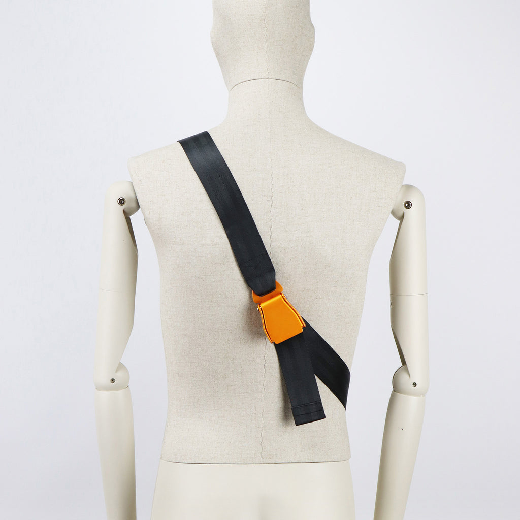 sand seatbelt sling bag L strap orange buckle on male mannequin eKodoKi RE-BELT