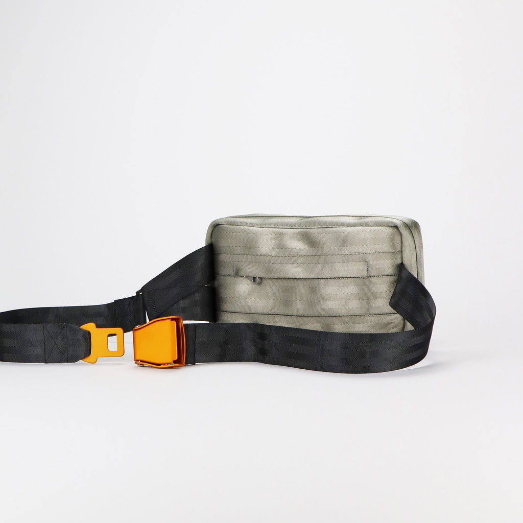 sand seatbelt sling bag M featuring orange buckle back eKodoKi RE-BELT