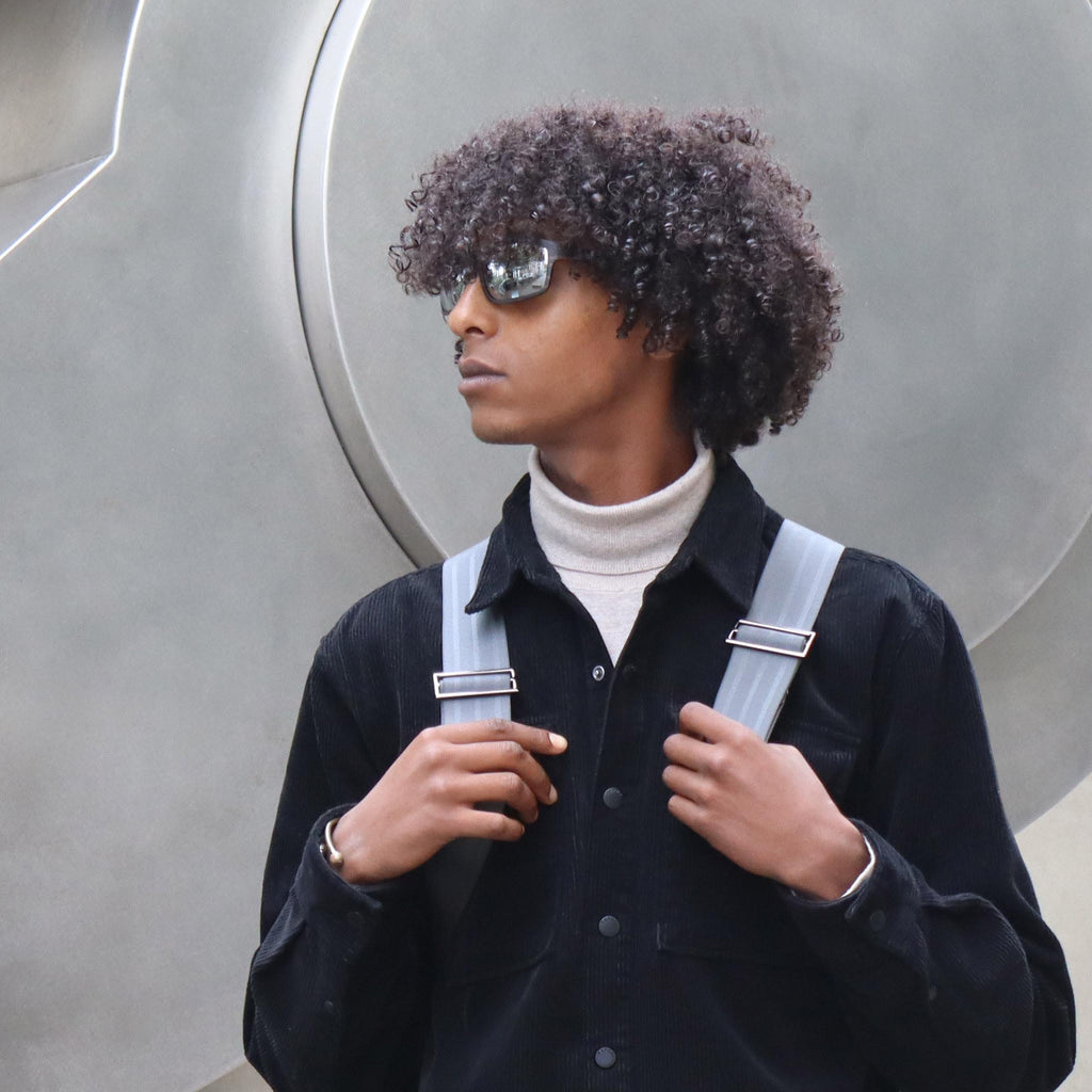 wooden sunglasses bug eye style striped ebony wood silver mirror lenses on male fashion model eKodoKi FLY