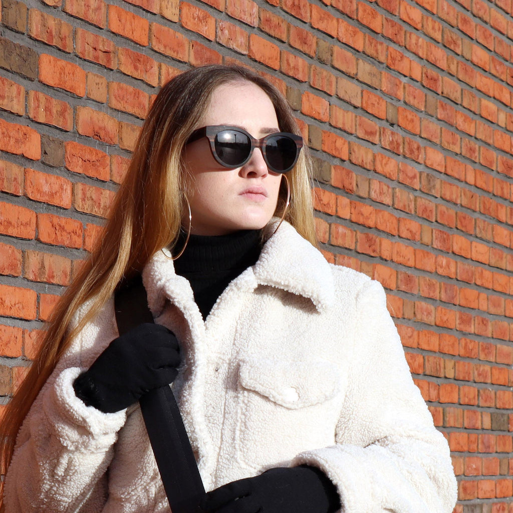 wooden sunglasses cat eye style ebony wood smoke lenses on female fashion model right side view eKodoKi FELINA