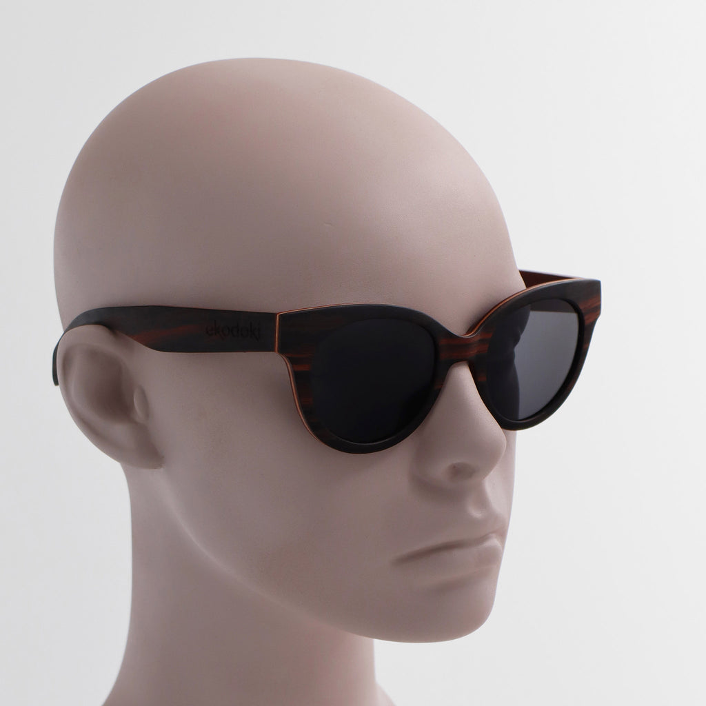 wooden sunglasses cat eye style ebony wood smoke lenses on white male mannequin head eKodoKi FELINA