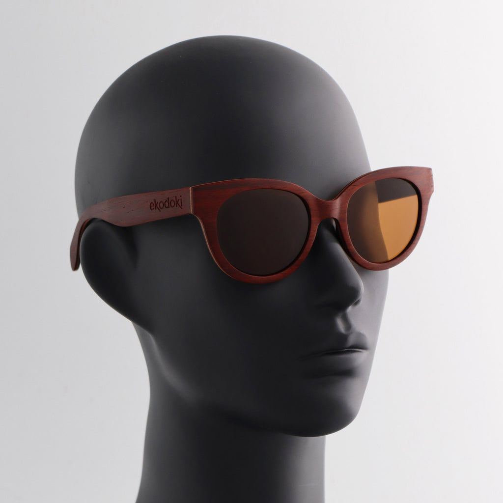 wooden sunglasses cat eye style redwood wood brown lenses on black female mannequin head eKodoKi FELINA