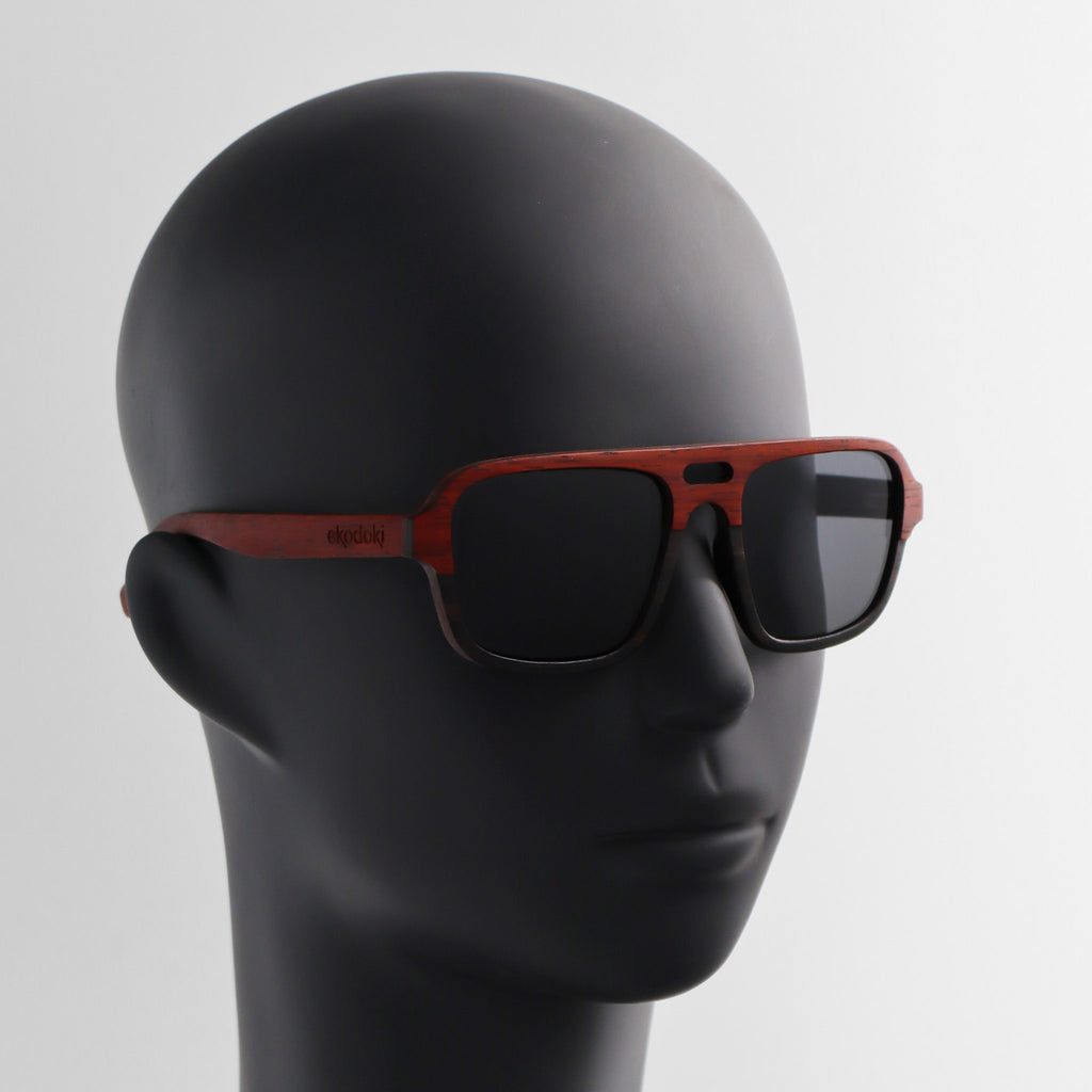 wooden sunglasses pilot style redwood and ebony wood smoke lenses on black male mannequin head eKodoKi DUDE
