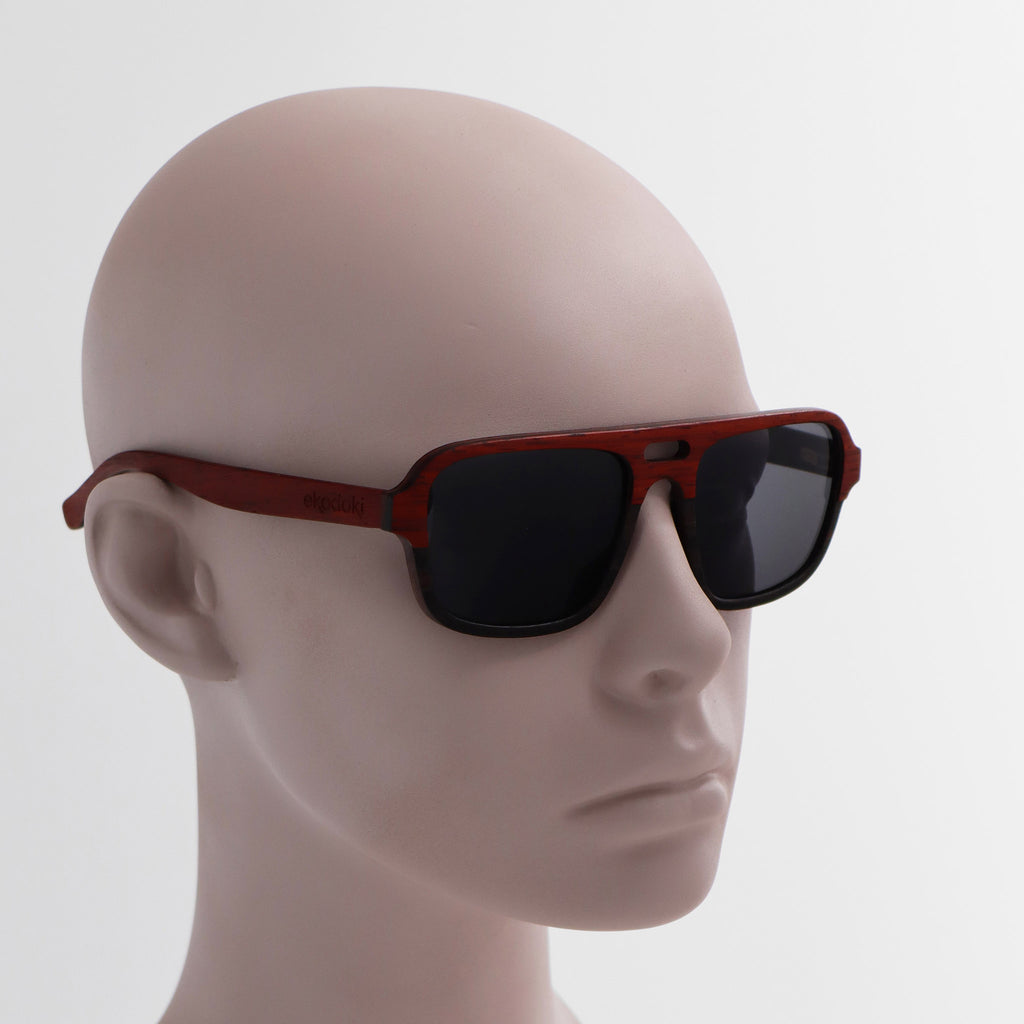 wooden sunglasses pilot style redwood and ebony wood smoke lenses on white male mannequin head eKodoKi DUDE
