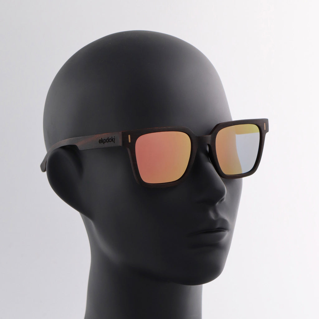 wooden sunglasses retro squared style ebony wood rose gold mirror lenses on black female mannequin head eKodoKi EDGE