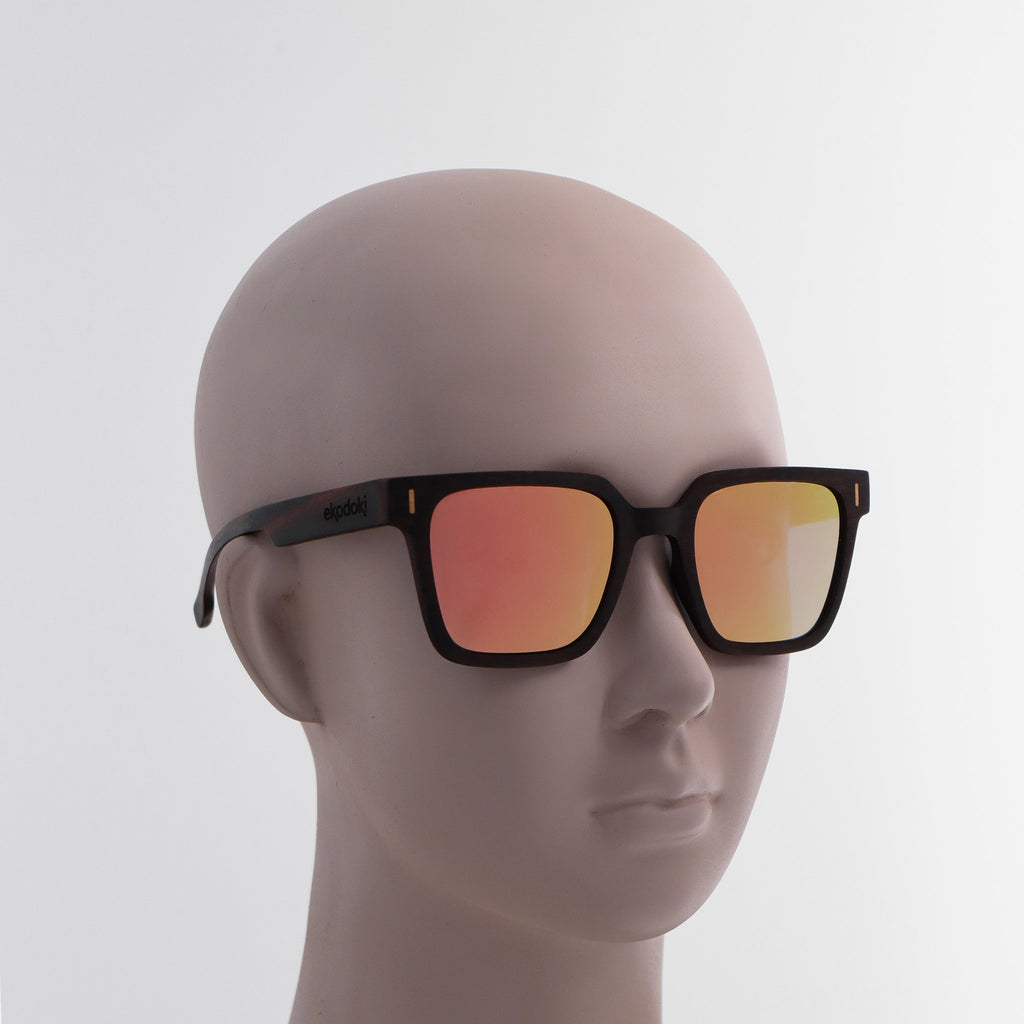 wooden sunglasses retro squared style ebony wood rose gold mirror lenses on white female mannequin head eKodoKi EDGE