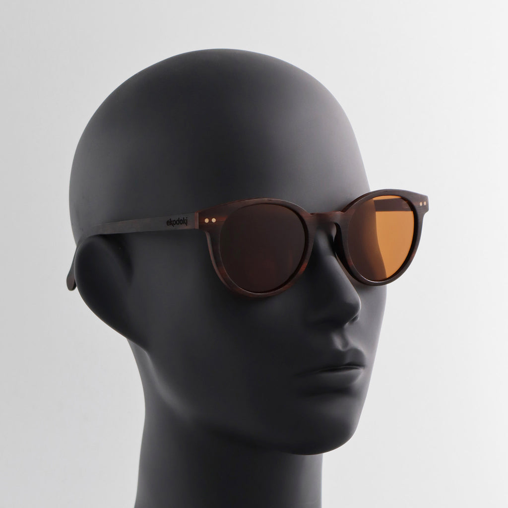 wooden sunglasses round pantos style ebony wood brown lenses on black female mannequin head eKodoKi SUNDAY