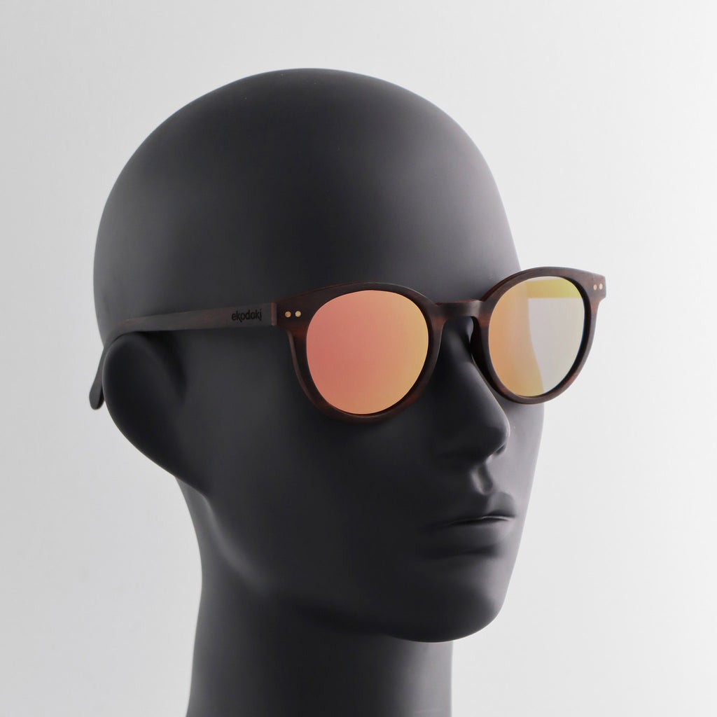 wooden sunglasses round pantos style ebony wood rose gold mirror lenses on black female mannequin head eKodoKi SUNDAY
