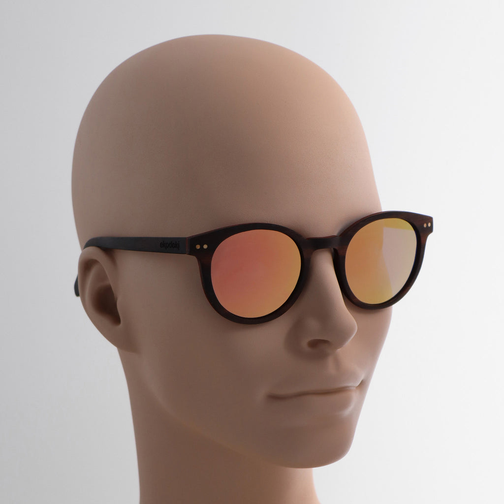 wooden sunglasses round pantos style ebony wood rose gold mirror lenses on tan female mannequin head eKodoKi SUNDAY