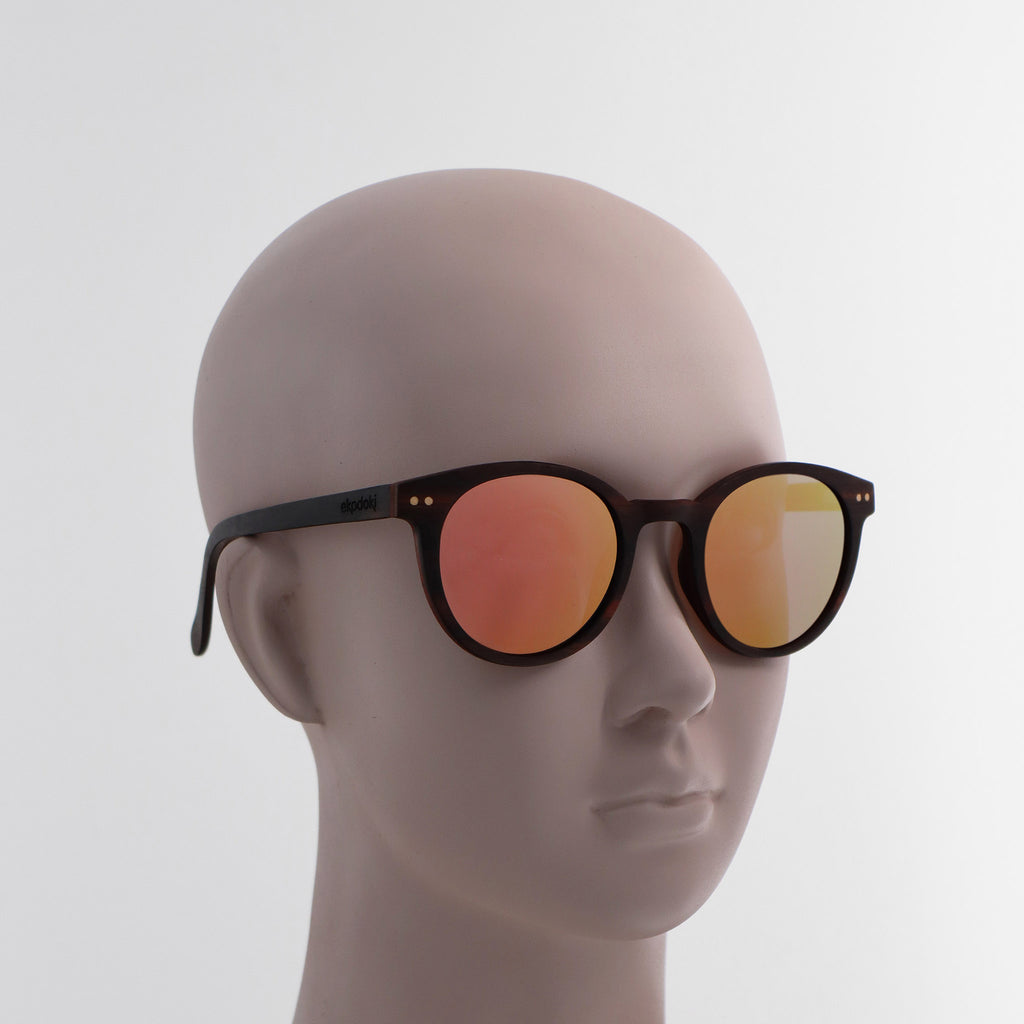 wooden sunglasses round pantos style ebony wood rose gold mirror lenses on white female mannequin head eKodoKi SUNDAY