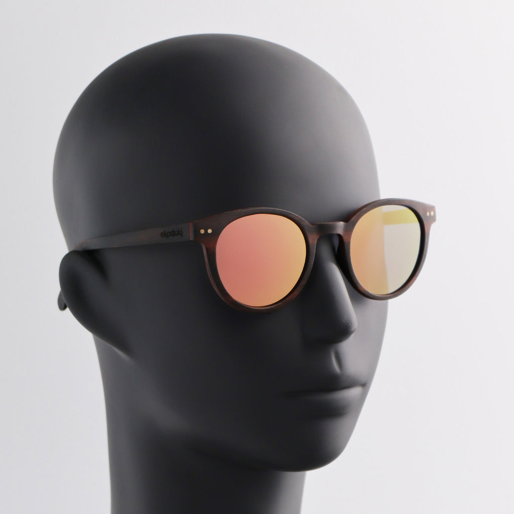 wooden sunglasses round pantos style ebony wood rose gold mirror lenses on black male mannequin head eKodoKi SUNDAY