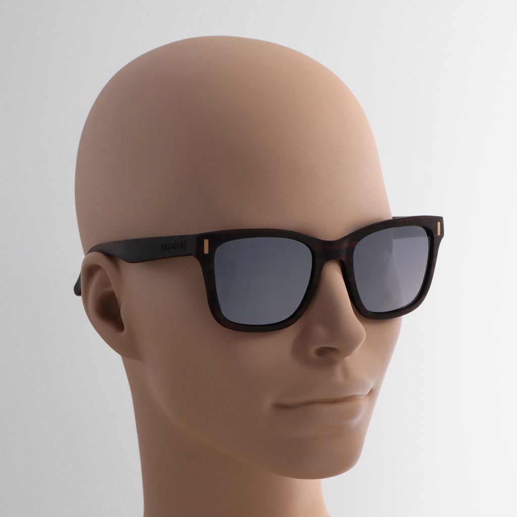 wooden sunglasses wayfarer style ebony wood silver mirror lenses on tan female mannequin head eKodoKi EYE-Q