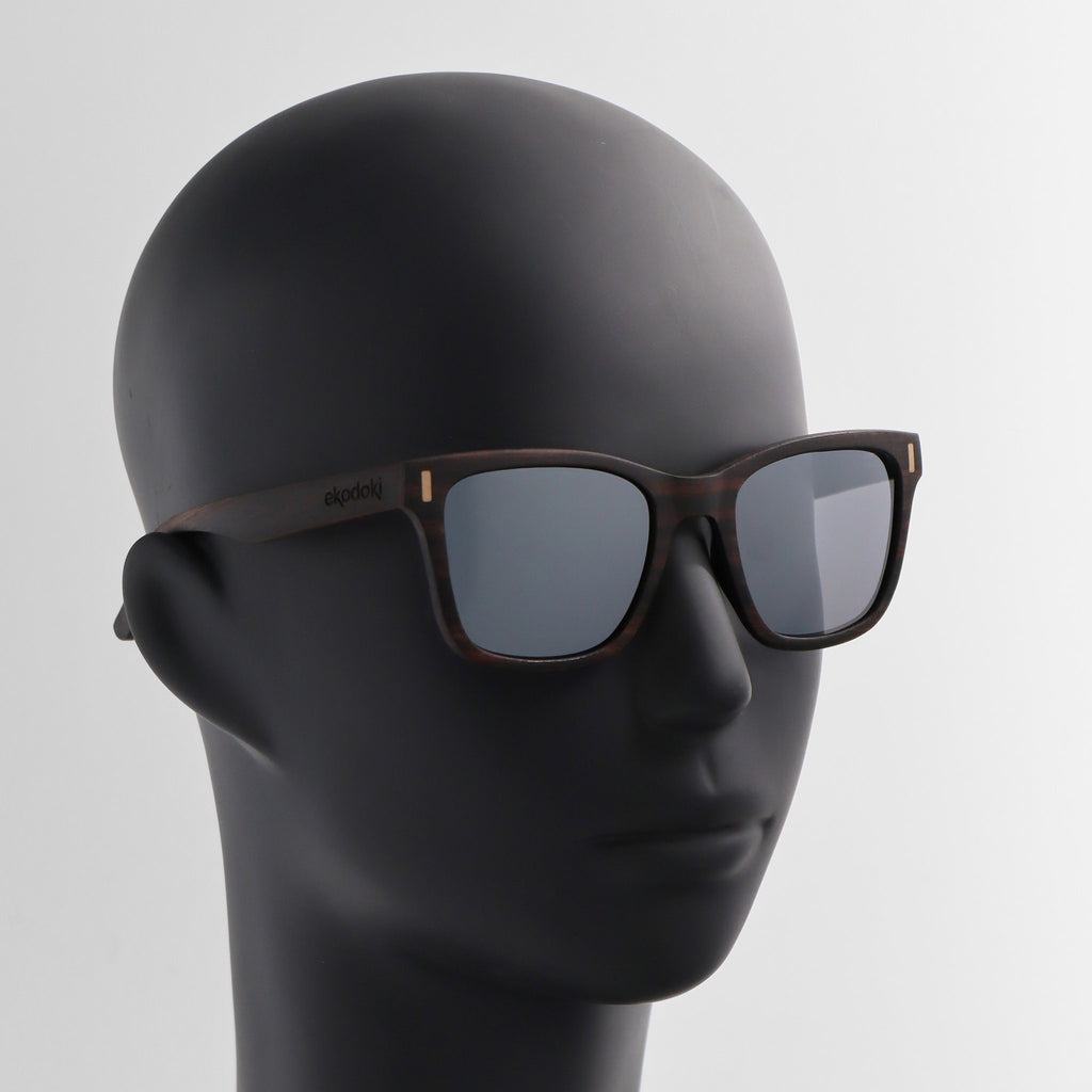 wooden sunglasses wayfarer style ebony wood silver mirror lenses on black male mannequin head eKodoKi EYE-Q