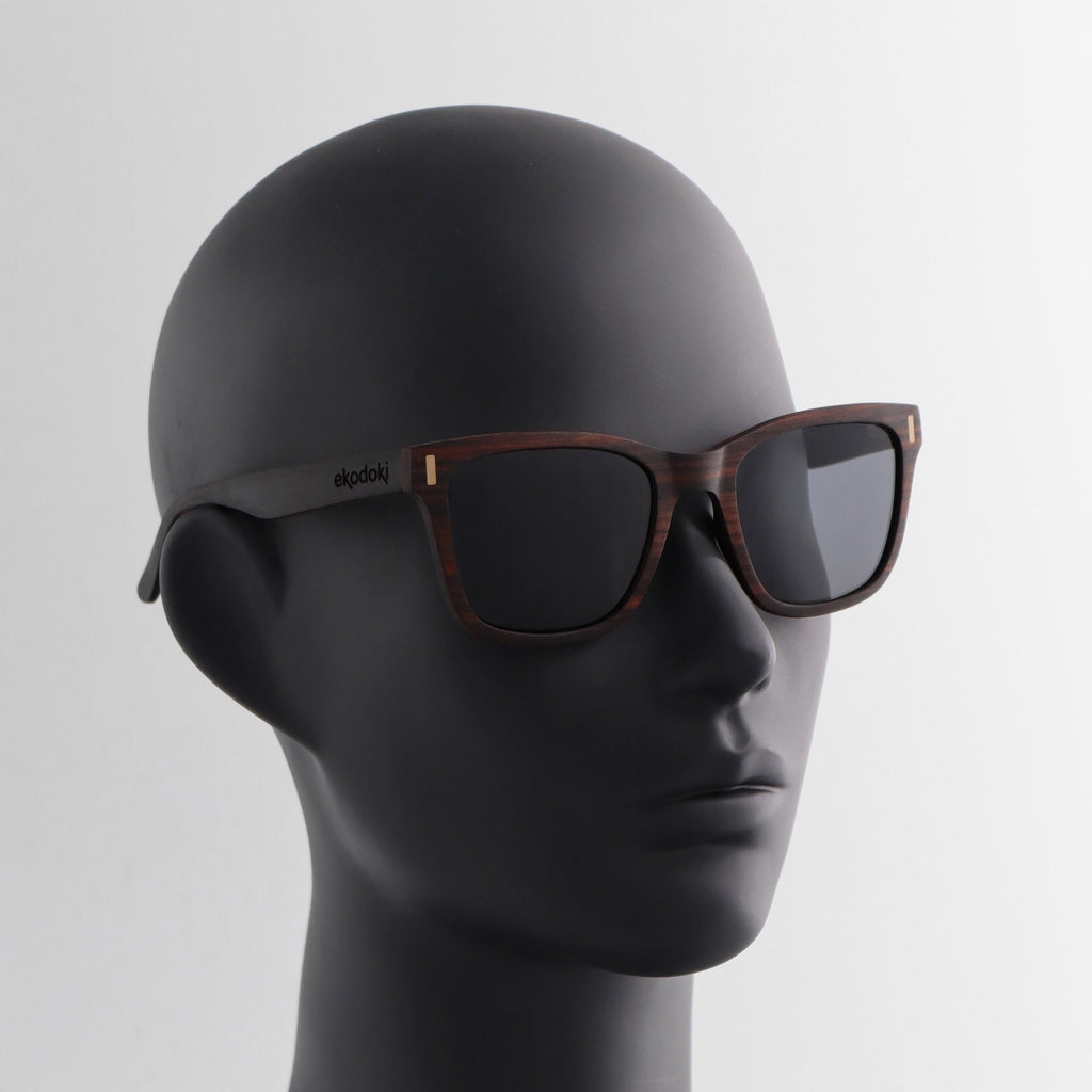 wooden sunglasses wayfarer style ebony wood smoke lenses on black female mannequin head eKodoKi EYE-Q