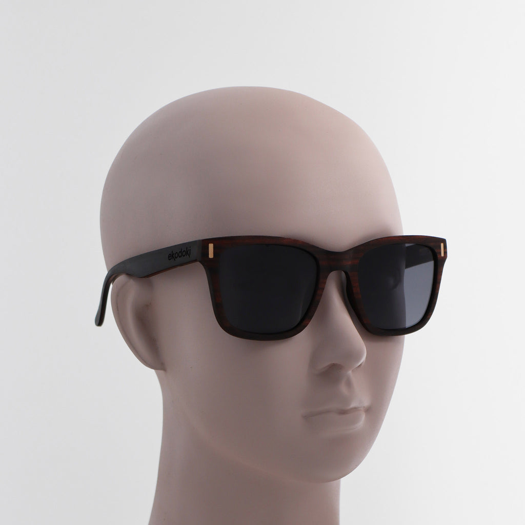 wooden sunglasses wayfarer style ebony wood smoke lenses on white female mannequin head eKodoKi EYE-Q