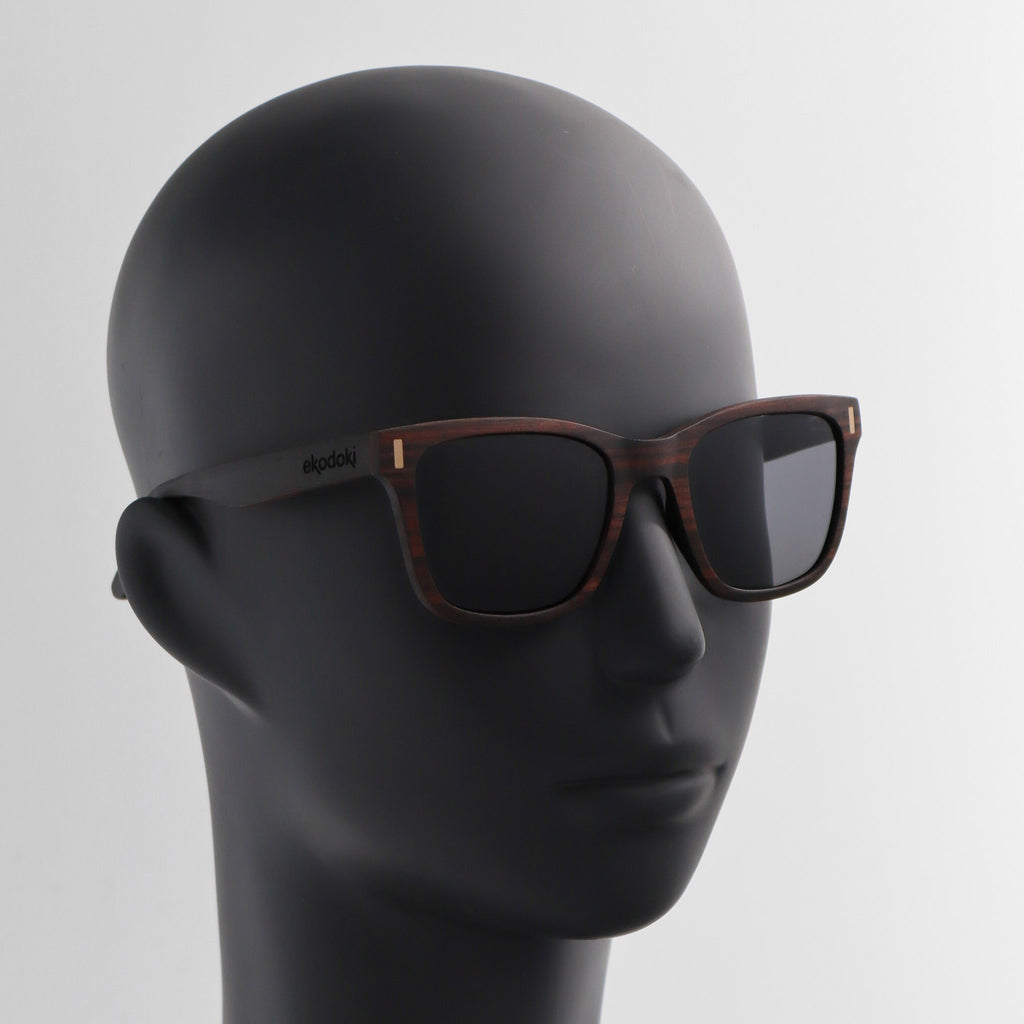 wooden sunglasses wayfarer style ebony wood smoke lenses on black male mannequin head eKodoKi EYE-Q