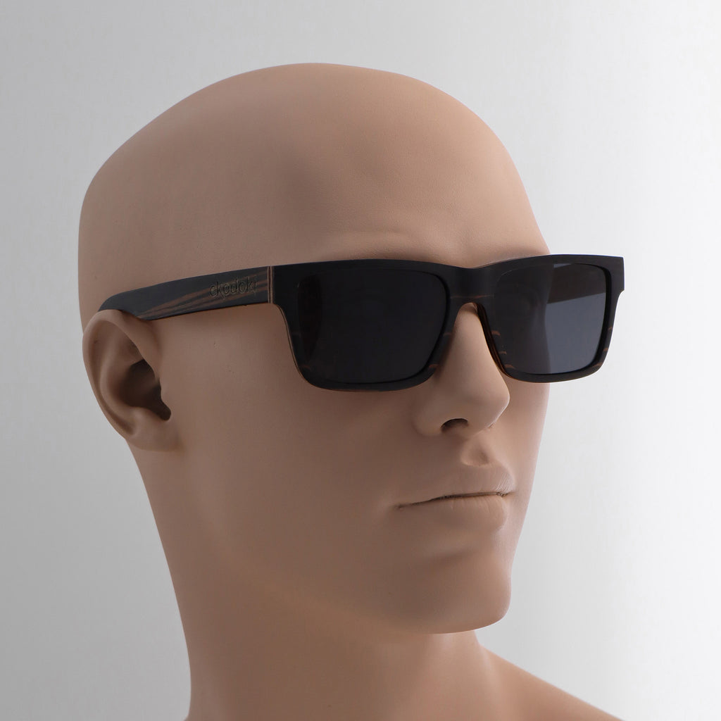 wooden sunglasses wayfarer style ebony wood smoke lenses on tan male mannequin head eKodoKi METRO
