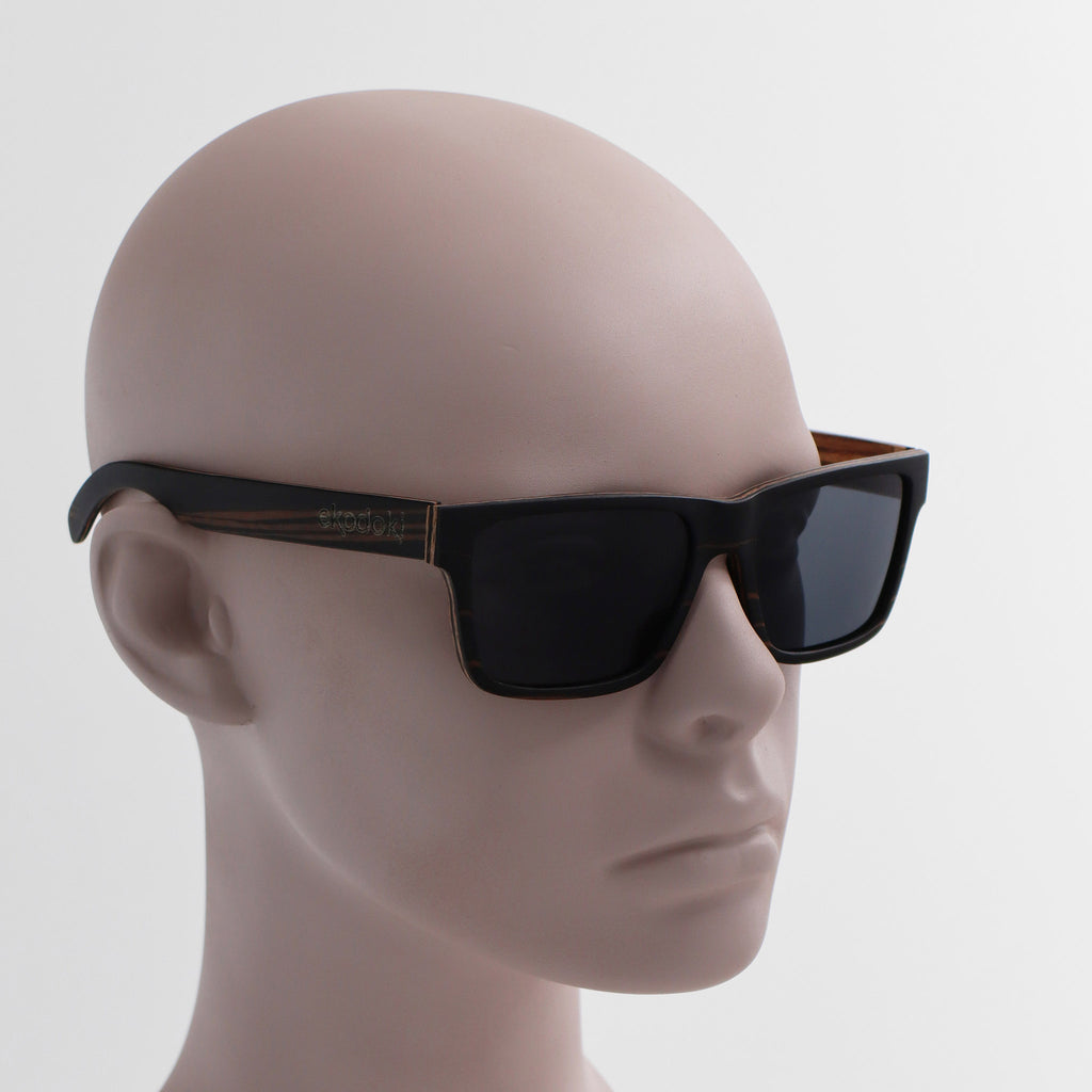 wooden sunglasses wayfarer style ebony wood smoke lenses on tan male mannequin head eKodoKi METRO