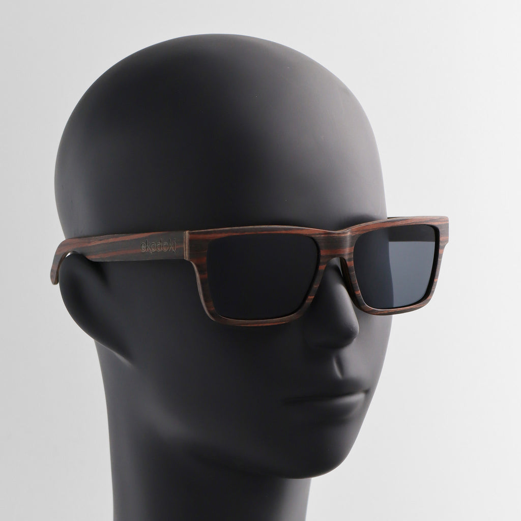 wooden sunglasses wayfarer style striped ebony wood smoke lenses on black male mannequin head eKodoKi METRO